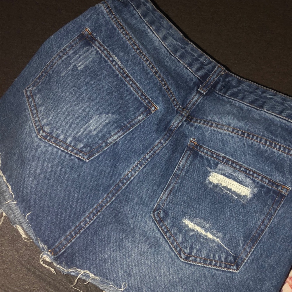jean skirt with ripped patches - Picture 2 of 2
